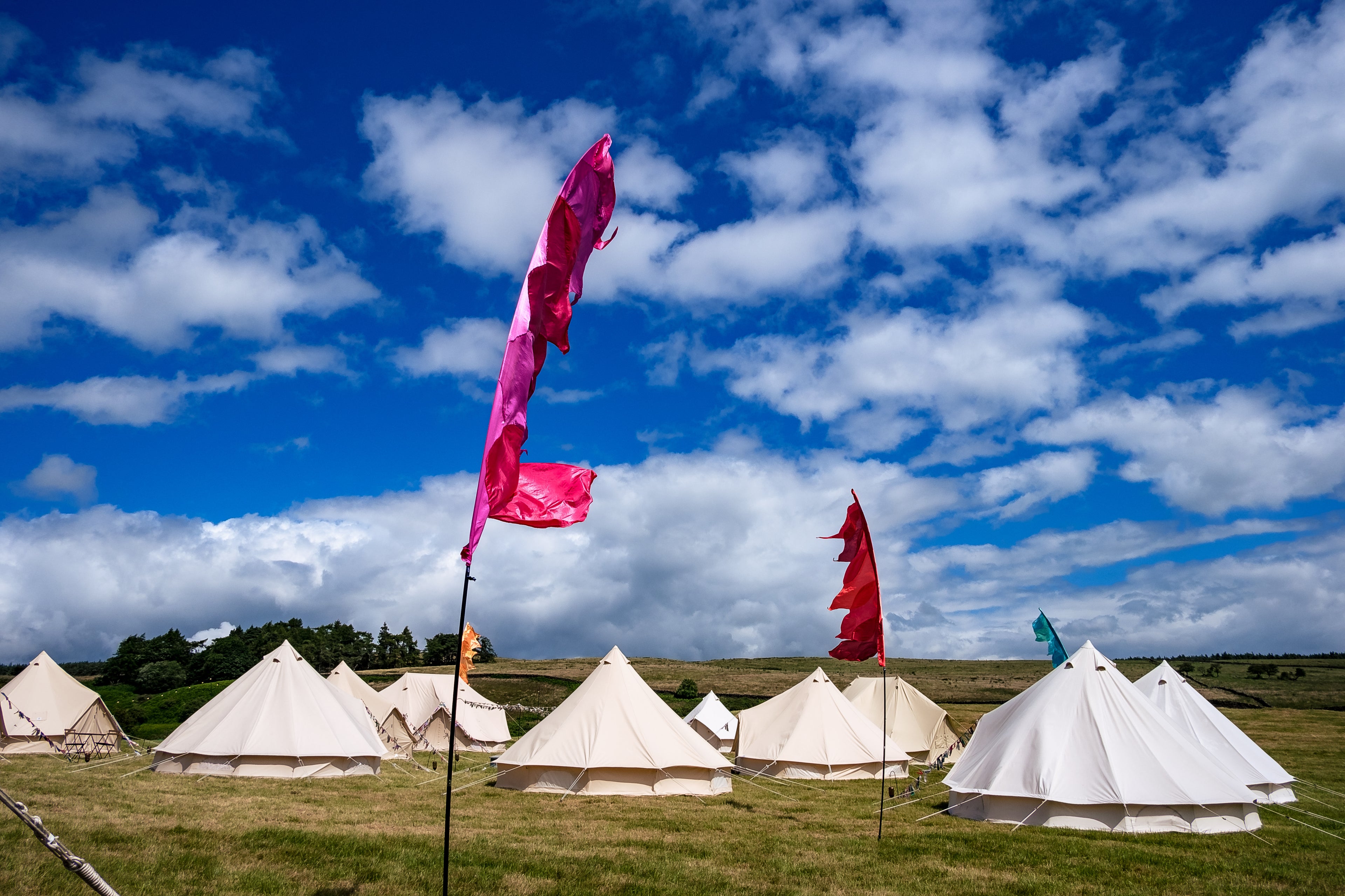 Bell Tent Village for Festival With Festival Flags